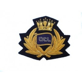 OCL Cap Badge